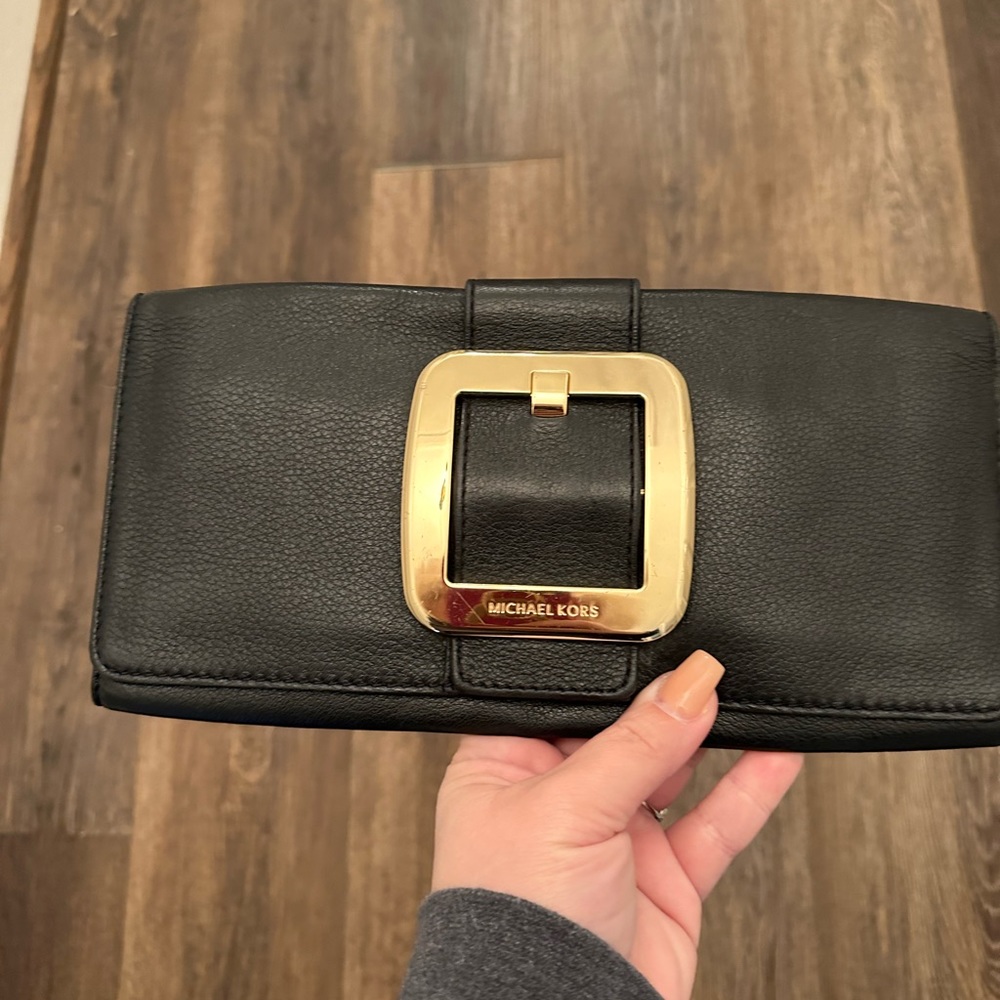 Authentic Michael Kors clutch. Great condition